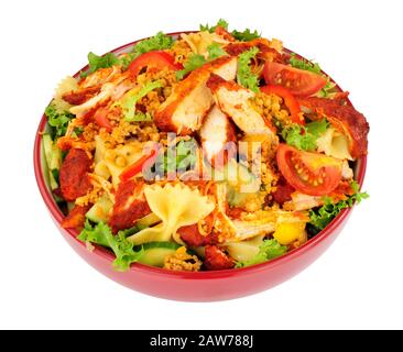 Chicken tikka and pasta salad bowl isolated on a white background Stock Photo