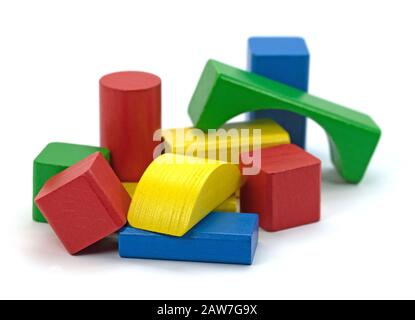 Colorful wooden building blocks against white background Stock Photo