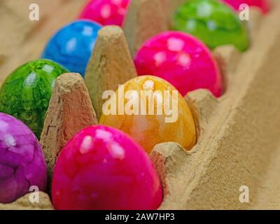 Colored eggs in the packaging Stock Photo