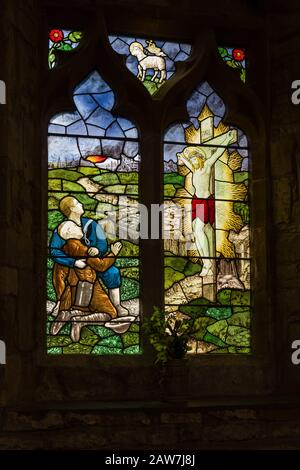 Stained glass window dedicated to the fallen of WW1 in the church of St Michael and All Angels, Bugbrooke, Northamptonshire, UK Stock Photo