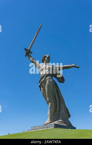 Volgograd, Russia - June 9, 2018: The Motherland Calls monument on top of war memorial complex Mamayev Kurgan in Volgograd city with tourists on top o Stock Photo