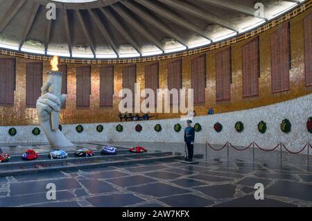 Volgograd, Russia - June 9, 2018: Soldiers on guard of honour near the Eternal flame in the Hall of Military glory on Mamayev Kurgan war memorial Stock Photo