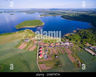 Aerial view of beautiful Doba village (former Doben, East Prussia) located on Dobskie Lake shore, Mazury, Poland Stock Photo