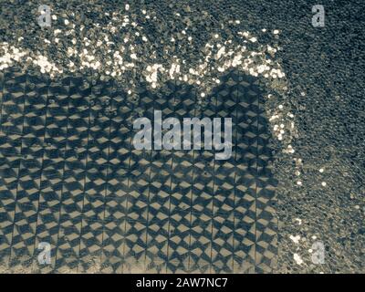 silvery brilliant background, light yellow foil with festive glitters Stock Photo