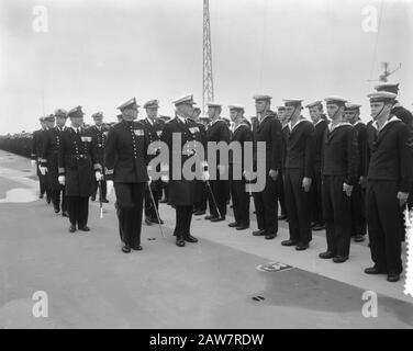 Transfer of command of Squadron V by Rear-Admiral L.E.H. Leeser on JRH commander. W.C.M. de Jonge van Ellemeet (deputy. Chief Naval Staff) (right) aboard Hr. Ms. Airbase Ship Karel Doorman Date: August 25, 1964 Location: Den Helder, Noord-Holland Keywords: navy, officers, ships Person Name: Young Ellemeet W.C.M. the, Reeser, L.E.H. Stock Photo