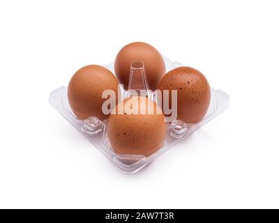 four eggs on the tray isolated on white background. food photo shot in studio with clipping path Stock Photo