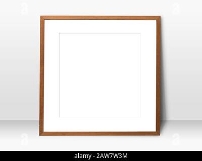 empty white space in wooden blank frame leaning against with white wall. simple blank photo frame for presentation or decorate background Stock Photo