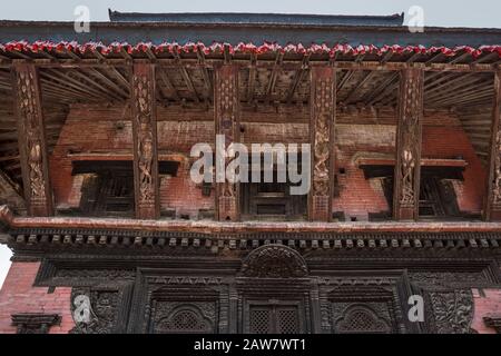 Carved roof struts depicting deities of Pashupatinath Temple at Durbar Square in Bhaktapur, Kathmandu valley, Nepal Stock Photo