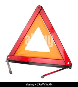 Emergency reflective car warning triangle used to warn others of a broken down vehicle, a legal requirement in most European countries, isolated Stock Photo