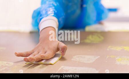 Close-up of a children in art therapy class drawing, painting and practicing engraving art. Child education in primary school at art class in Spain Stock Photo