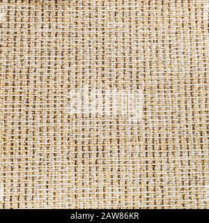 Rustic canvas fabric texture in white braided thread magenta color. Stock Photo
