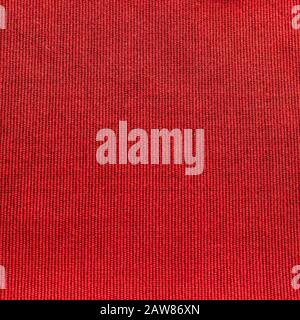Rustic canvas fabric texture in red woven color. Stock Photo