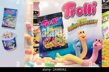 COLOGNE, February 2020: Trolli sour glowworms characters on display at ISM trade fair Stock Photo