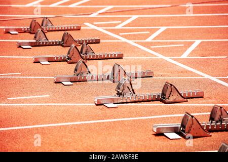 Close-up of starting blocks on stadium track for sprint running Stock Photo