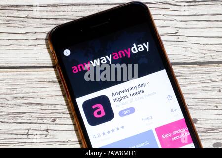 Los Angeles, California, USA - 25 January 2020: Logo of Anywayanyday mobile app on phone screen close up top view on wooden table, Illustrative Stock Photo