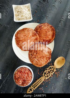 red rice pancakes, Fermented and steamed Indian rice pancakes, challapongaram, south indian recipes, appam, cafe, tasty, food, kitchen, organic, vegan Stock Photo