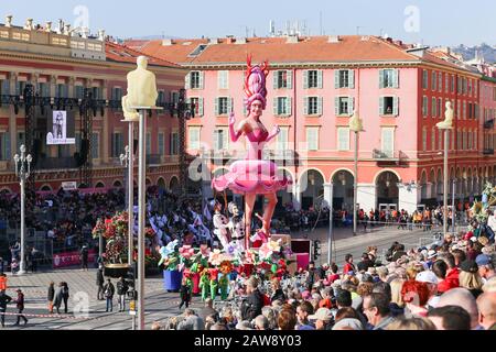 Nice, Cote d’Azur, France - February 20 2019: Carnaval de Nice, This years theme King of Cinema (ROI du Cinéma)  - Bright pink ballerina float stands Stock Photo