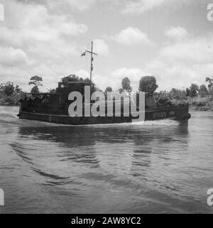 [Patrol boat on the river] Date: 01/01/1947 Location: Indonesia Dutch East Indies Stock Photo