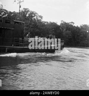 [Patrol Boat with cannon on the bow of a river] Date: 01/01/1947 Location: Indonesia Dutch East Indies Stock Photo