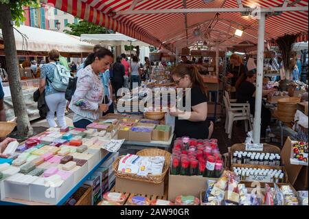 Nice, France - 14th May, 2015: Market stall selling fragrant soaps at the famous Cours Saleya Market in old town Nice, France Stock Photo