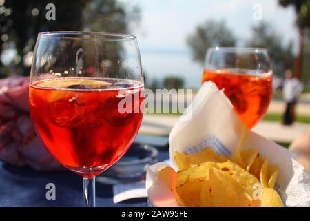 Aperol, wine, chips, for a perfect pre-dinner Stock Photo
