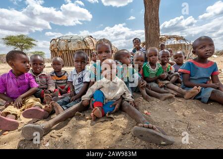 Village children with their teacher, in Samburu, Kenya Stock Photo