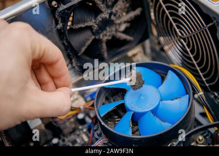 Dust on computer pc processor cooler with mainboard. concept Component maintenance. Stock Photo
