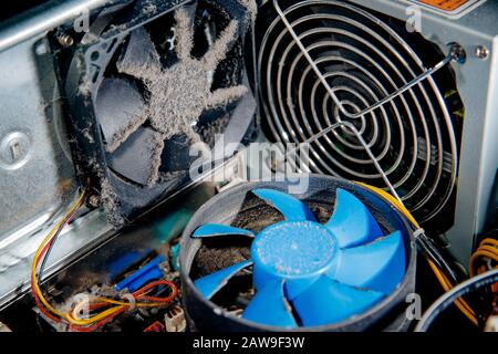 Dust on computer pc processor cooler with mainboard. concept Component maintenance. Stock Photo