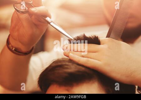 Haircut male Barbershop. Men Hairdressers. Barber use scissors client for haircuts Stock Photo - Alamy Haircut male Barbershop. Men Hairdressers. Barber use scissors client for haircuts Stock Photo - Alamy