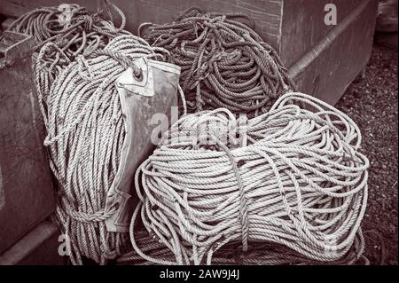 Spooled up and stowed rope and twisted nylon line, used for