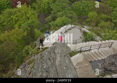 ALESUND, NORWAY - MAY 29, 2017: People climbing the stairs to Fjellstua in Alesund in Norway. Stock Photo