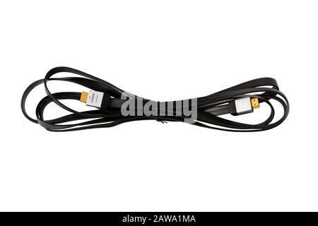 HDMI cable on white background. HDMI cable with gold-plated a connector. High Definition Media Interface. HDMI cable isolated. Stock Photo