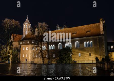Backside of Braunschweig castle illuminated in winter night Stock Photo