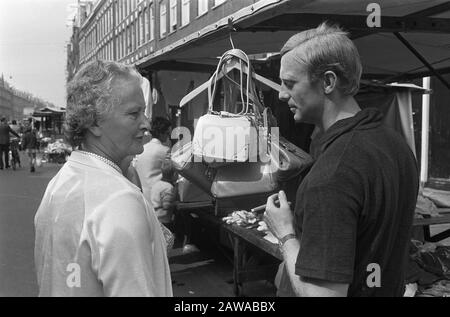 Piet Kruiver (former footballer) as a merchant in his stall at the