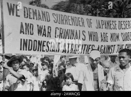 Anti-Republican demonstration Medan (reproductions)  Medan: a two kilometer procession, consisting of twelve Chinese held in Medan on September 4 a protest demonstration against the violence perpetrated by the Republic. 'We demand the extradition of Japanese deserters and war criminals who now have a guiding hand in the atrocities committed by Indonesians against Chinese' Date: September 4, 1947 Location: Indonesia, Medan, Dutch East Indies, Sumatra Stock Photo