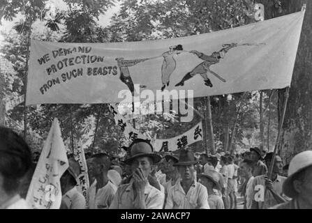 Anti-Republican demonstration Medan (reproductions)  Medan, Medan drew on September 4 by a two-kilometer procession. More than twelve thousand Chinese victims of Republican violence demonstrated for the Dutch and Chinese authorities. Banners with texts like 'Against these animals we want to be protected ...' Date: September 4, 1947 Location: Indonesia, Medan, Dutch East Indies, Sumatra Stock Photo