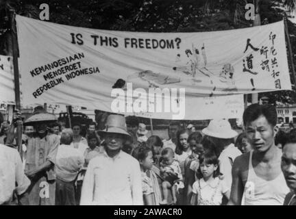 Anti-Republican demonstration Medan (reproductions)  Medan, Medan drew on September 4 by a two-kilometer procession. More than twelve thousand Chinese victims of Republican violence demonstrated for the Dutch and Chinese authorities. Banners with texts like 'Is this freedom?' or 'The Humanity of the Republic of Indonesia' Date: September 4, 1947 Location: Indonesia, Medan, Dutch East Indies, Sumatra Stock Photo