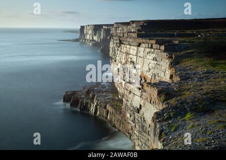 Cliffs on Inishmore island, largest of the Aran islands on the Wild Atlantic Way in Galway Ireland Stock Photo