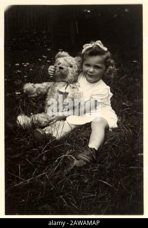 GIRL WITH TEDDY 1930S Stock Photo - Alamy