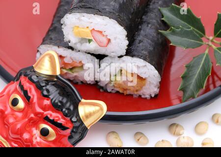 Japanese traditional Setsubun event, Masks of Oni demon and ehomaki are used on an annual event Stock Photo