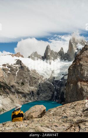 Beautiful setting where a person observes Fitz Roy and Laguna Sucia in Paratgonia Argentina. Stock Photo