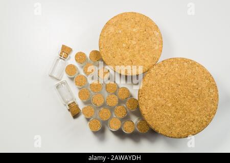 Empty little bottles with cork stopper isolated on white. glass vessels. transparent containers. test tubes. various corks Stock Photo