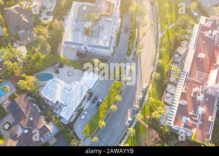 Aerial view of Beverly Hills neighborhood: Sunset Boulevard, North Beverly Drive and Rodeo Drive surrounded with palm trees in Los Angeles, California Stock Photo