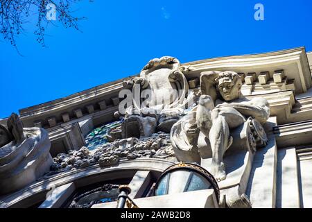 Sculptures on the facade of the ex-National bank of Georgia building on Leonidze street in Tbilisi's downtown Stock Photo