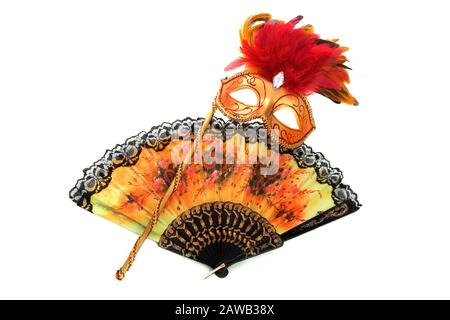 Image of the bright mask and a fan on a white background Stock Photo