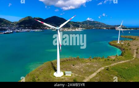 Aerial view: Offshore wind turbines in Seychelles, Mahe Victoria Stock Photo