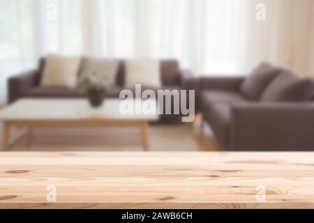 blur classic living room with sofa and wooden table top vintage home style for house products montage advertising background Stock Photo