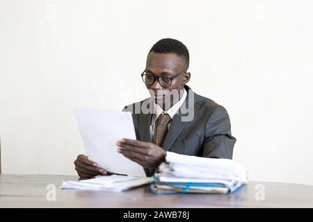 Candid young human working executive working hard Stock Photo