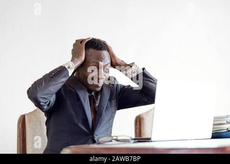 Black skinned handsome worker working employee isolated Stock Photo