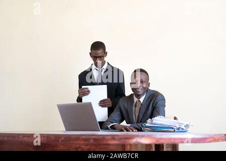 Black Ethnicity two business people working at university in the heart of Africa Stock Photo